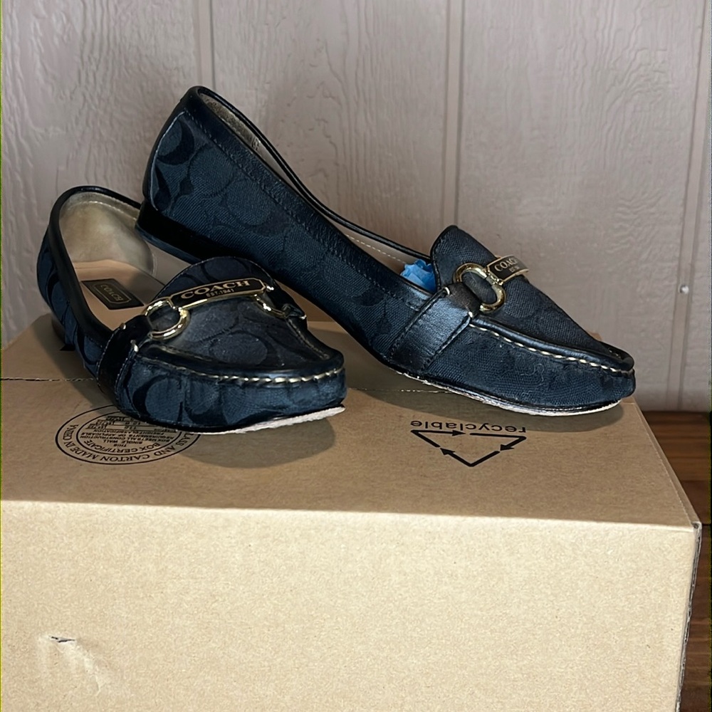 Coach vintage loafers size 8 black with gold hardware.